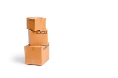 Cardboard boxes on a white background. The concept of packing goods, sending  Stock Photos