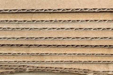 Cardboard, carton layers side view edges texture, background close up Stock Photos