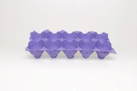 Cardboard container for eggs close-up. Smooth rows, forms for laying eggs. Ab Stock Photos