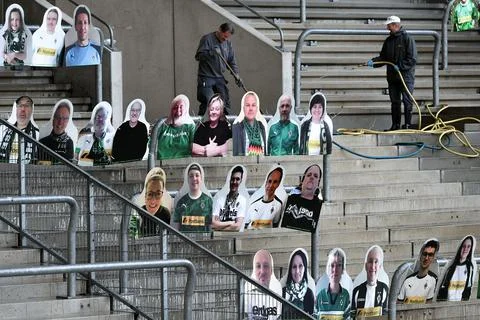 Cardboard cutouts replace supporters at empty soccer stadium in Germany, Moenche Stock Photos