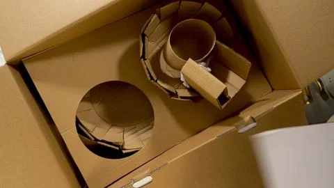 Cardboard Divider and Pans Inside Box Stock Photos