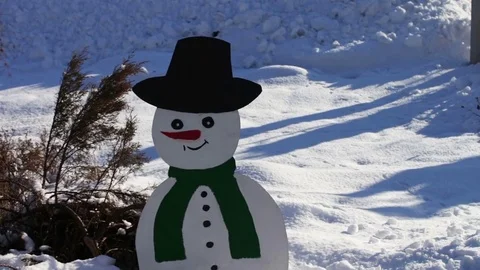 The cardboard figure of a snowman Stock Footage