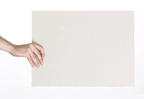 Cardboard frame in the hands on a white background Stock Photos