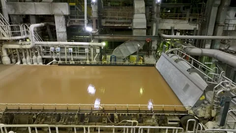 Cardboard making machine. Softwood pulp is fed into the cardboard making machine 스톡 동영상 326162943