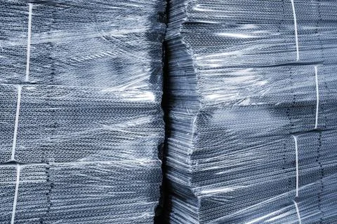 Cardboard packaging in cellophane Stock Photos