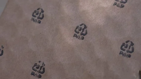 Cardboard packaging. PAP 21 logo printed on a cardboard, paper recycle Stock Footage 313851963