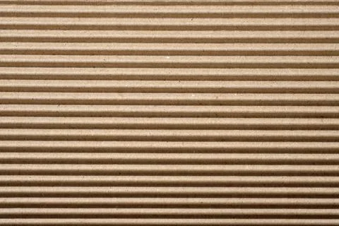 Cardboard packing material texture. Stock Photos