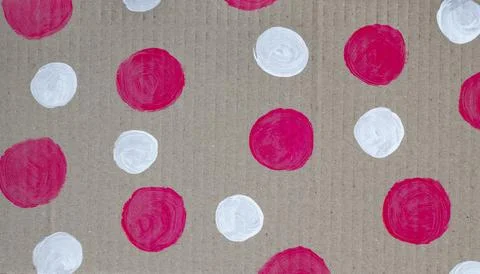 Cardboard with a pattern of white and pink circles. Stock Illustration
