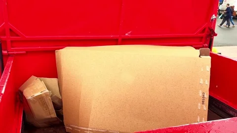 Cardboard pressing machine. Close-up of cardboard recycling for storage Video stock 250076412