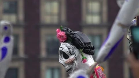 A cardboard skeleton puppet with a monk costume Stock Footage 138328258