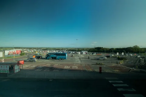 Cardiff Airport Entrance / Drop Off Zone Activity Stock Footage