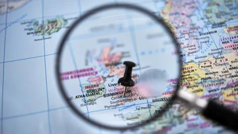 CARDIFF highlighted on paper map with magnifying glass Stock Photos