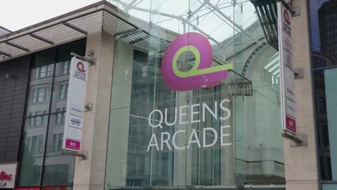 CARDIFF, UK - AUGUST 8, 2025 - Queens Arcade shopping center logo in Cardiff, Stock Footage 314803914