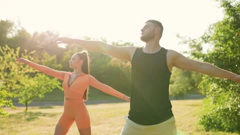 Cardio Session Fit Couple Doing a Joint Workout Outdoors Stock Footage 247418814