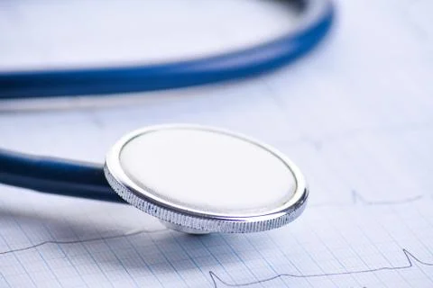 Cardiogram with stethoscope on table, closeup Stock Photos