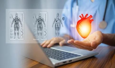 Cardiologist doctor using computer visual screen learning data for treatmen.. Stock Photos