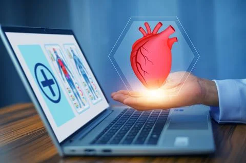 Cardiologist doctor using computer visual screen learning data for treatmen.. Stock Photos