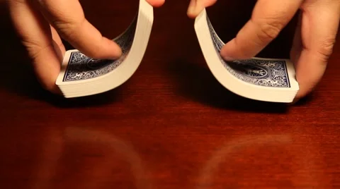 Cards being shuffled Stockbeeldmateriaal 50340055