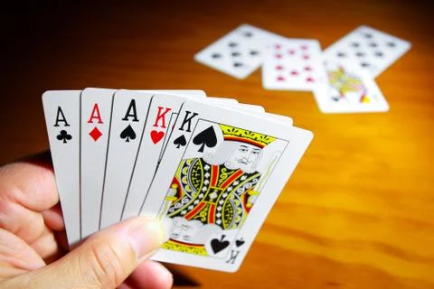 Cards hand Stock Photos