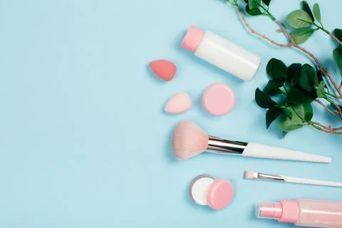 Care cosmetics on green background Stock Photos