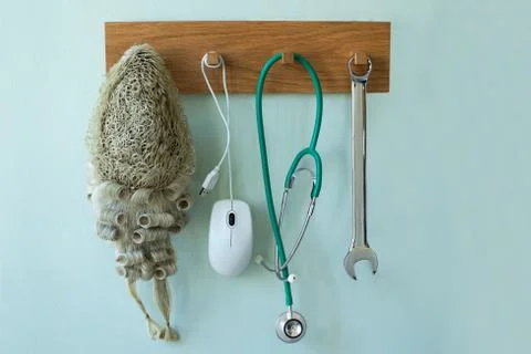 Career Concept With Tools Associated With Different Professions Hanging On Wa Foto stock