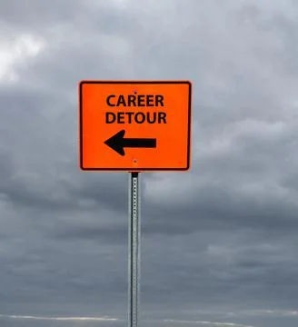 Career Detour construction sign with arrow and cloudy sky Stock Photos