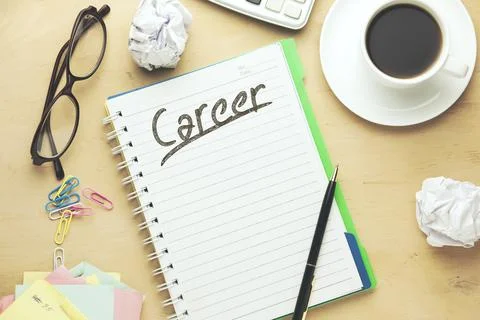 Career Text written on notepad Stock Photos