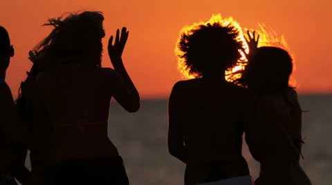 Carefree Young People Beach Vacation Sunset Stock Footage
