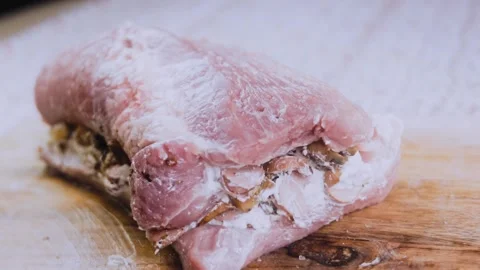 Careful dynamic preparation: slicing cooked sausage into rounds Stock Footage 342184590