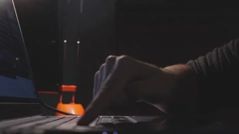 Careful female finger gently touching pressing laptop keyboard buttons in dark r Stock Footage 161038053