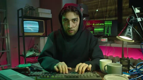 Careful hacker stealing information with usb from laptop, preparing to break 動画素材 158627167
