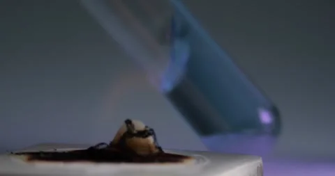 Careful Heating Methyl Violet Solution with Oxalic Acid, Water Base Mixture over Stockbeeldmateriaal 322596493