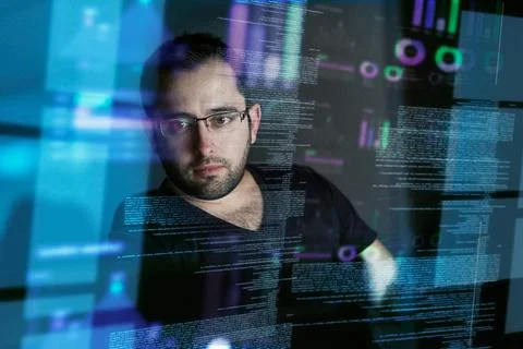 Careful not to get lost in the code. Cropped shot of a young computer program Stock Photos