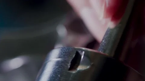 Carefully loading stainless revolver with silvertip hollow points in the dark Stock Footage 161863217