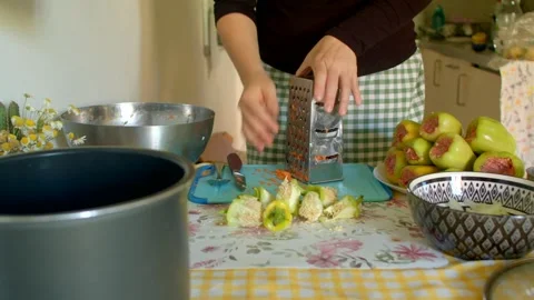 Carefully preparing various ingredients for cooking in the kitchen Stock Footage 318923971