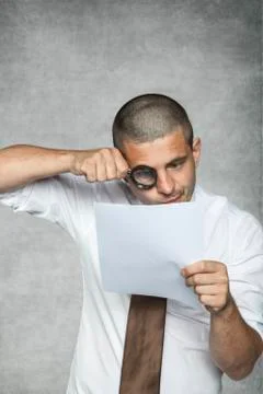 Carefully reading the contract Stock-Fotos