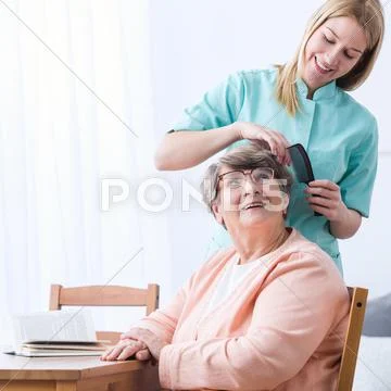 Caregive take care of patient Stock Photos