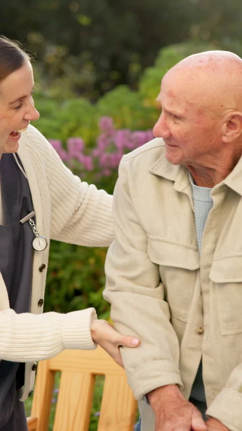 Caregiver, support and old man with cane, outdoor and healthcare service for Stock Footage 340971790