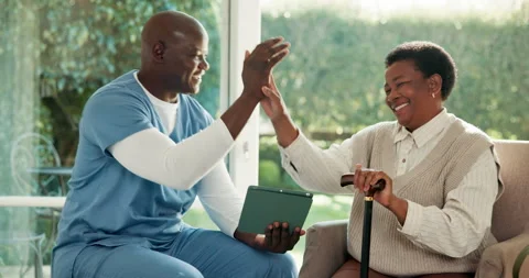 Caregiver, tablet and high five for woman with cane, rehabilitation and great Stock Footage 341661028