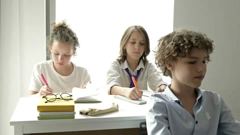 Careless student interferes with classmates. Back to school. Stock Footage 134789116