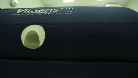 Carema slides along the hyperbaric camera 動画素材 74381096