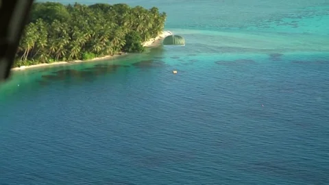 Cargo attached to parachute drops into ocean in Guam  Stock Footage 83350028