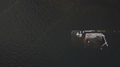 Cargo barge, lies at the bottom of the river. copter flies over a sunken ship. Stock Footage 149894103