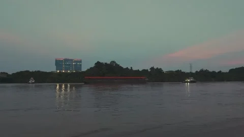 Cargo Barge on Mahakam River at Dusk Stock-Footage 341997433
