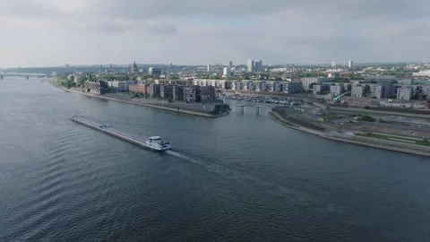 Cargo Barge Sailing Along Urban River, Aerial Drone Shot Stock-Footage 342287655
