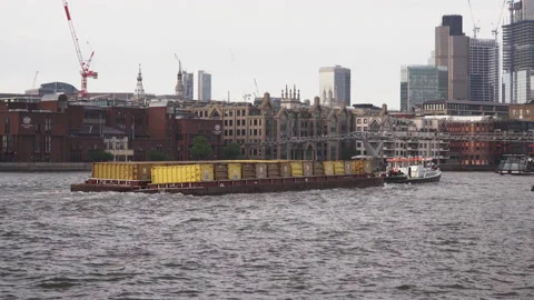 Cargo boats crossing Thames river. London. Stock Footage 147138335