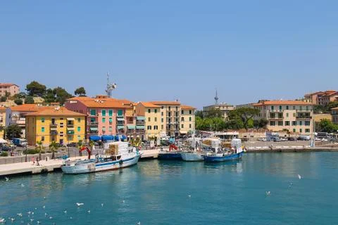 Cargo boats in Portoferraio harbour, view from the sea Stock Photos