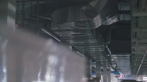 Cargo boxes in large  supply chain factory warehouse, ready to be exported. Stock Footage 157397246