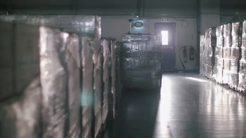 Cargo boxes in large  supply chain factory warehouse, ready to be exported. Stock Footage 157397344