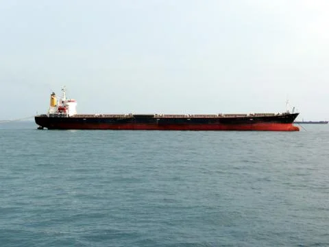 Cargo Container at anchor 库存照片